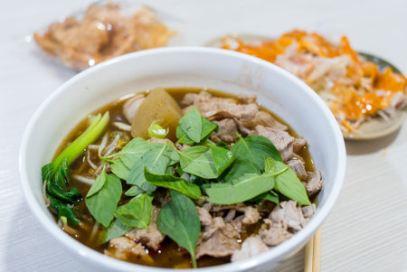 Vietnamese noodles with pork and basil soup