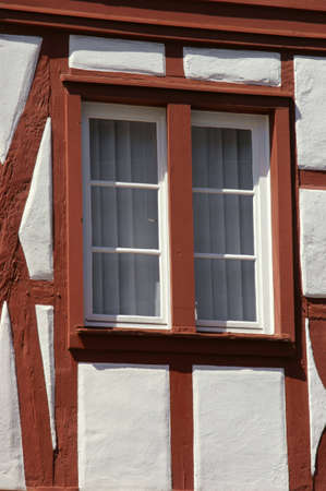 Window on an old half-timbered house in the historical centre of Trier, the oldest city in Germanyの写真素材