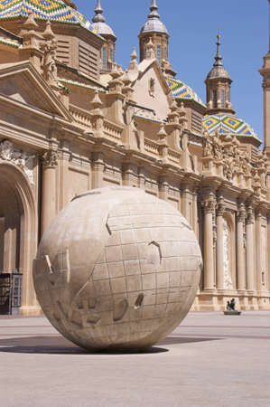 Plaza de Nuestra Senora del Pilar (Our Lady of the Pillar square) in Zaragoza with the "Globo Terraqueo" made by the aragonese sculptor Francisco Rallo Lahoz and the Basilica of Our Lady of the Pillar.のeditorial素材