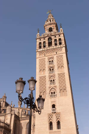 The bell tower of the Cathedral of Seville, known as the "Giralda". The tower was the minaret of the cityのeditorial素材