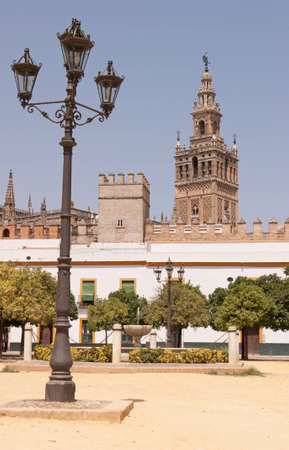 View of the Giralda tower from the "Patio de Banderas" in the "Real Alcazeres", in Sevilla (Spain)のeditorial素材