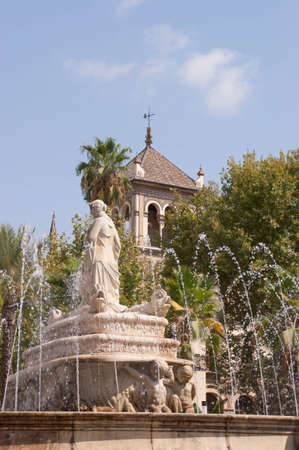 The fountain of Seville (Fuente de Sevilla) in Puerta de Jerez square. The fountain was designed by Manuel Delgado Brackembury in 1929 for the Ibero-American Exposition Worldのeditorial素材