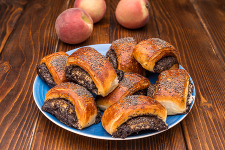strudel on a plate on a wooden backgroundの写真素材