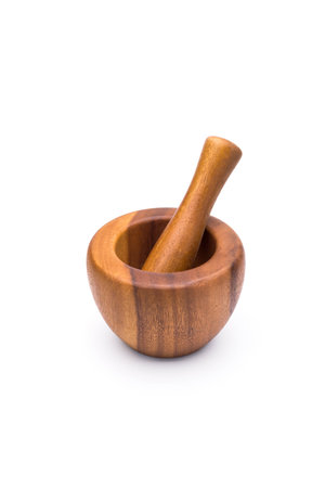 wooden mortar on a white backgroundの写真素材