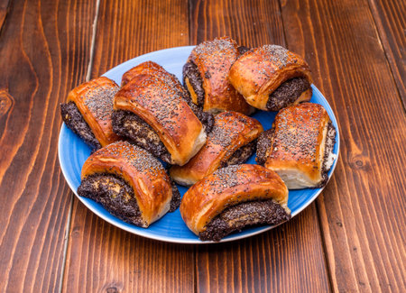 strudel on a plate on a wooden backgroundの写真素材