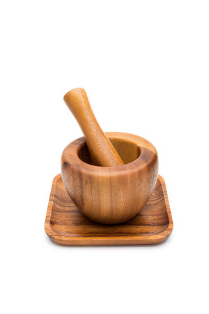 wooden mortar on a the white backgroundの写真素材
