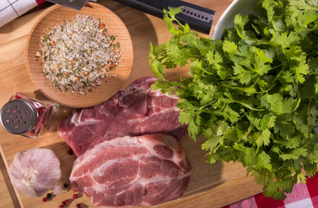 Pork steak on a cutting wooden boardの写真素材