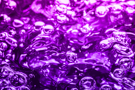 bubbles of different color in the water bright high lightsの写真素材