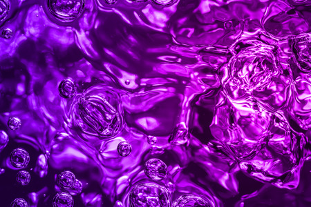 bubbles of different color in the water bright high lightsの写真素材
