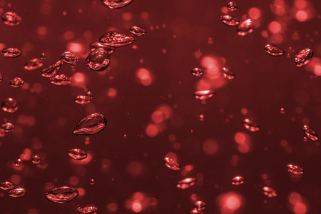 bubbles of different color in the water bright high lightsの写真素材