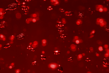 bubbles of different color in the water bright high lightsの写真素材