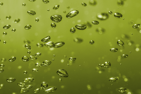 bubbles of different color in the water bright high lightsの写真素材