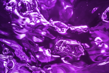 bubbles of different color in the water bright high lightsの写真素材