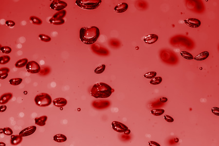 bubbles of different color in the water bright high lightsの写真素材