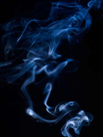 Artistic smoke in the darkの写真素材