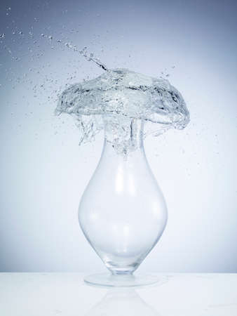 Exploding water balloon on the vaseの写真素材