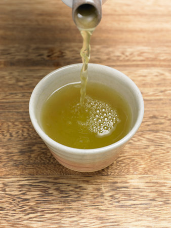 Image of putting Japanese teaの写真素材