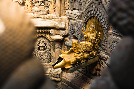 Tusha Hiti: A sunken water tank in Sundari Chowk, one of the many courtyards in Patan's Durbar Square.  The tank is thought to have been used as a bathing pool for the king. Kathmandu, Nepal.のeditorial素材