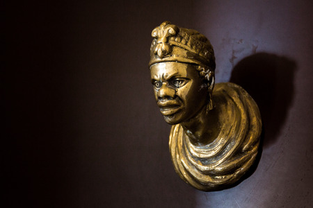 Door knob in the shape of the face of an African man. Venice, Italy.の写真素材