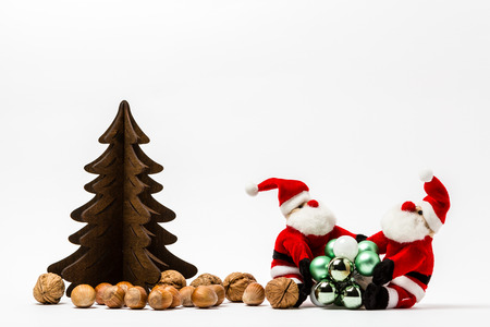 Two Santa Clauses with Christmas decorationsの写真素材