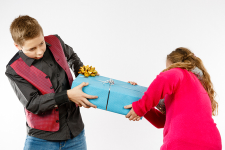 Boy and girls bicker Because of a presentの写真素材