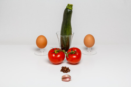 A face from cereals and vitamins, isolatedの写真素材