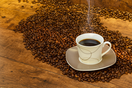 Black, aromatic coffee in the morning sunの写真素材