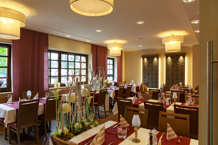 Dining room with white tables coveredの写真素材