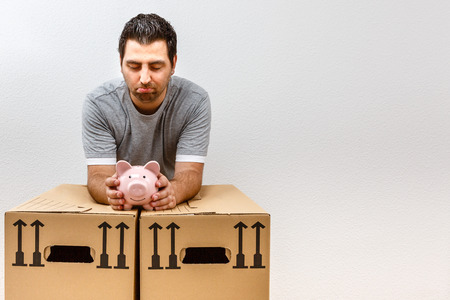 Expensive move, sad man, disappointed man, conceptの写真素材