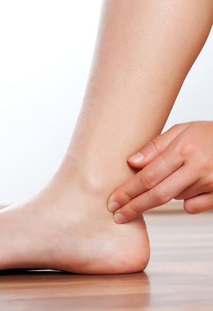 Check your pulse on your legの写真素材