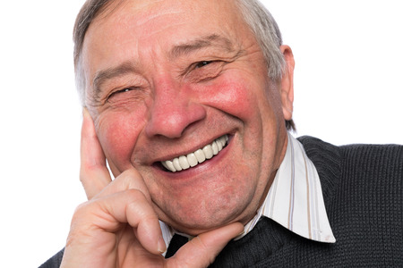 Portrait of an elegant senior man isolated on white background