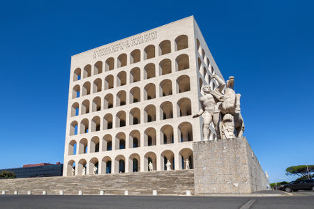 Rome, Italy - June 8, 2022: The Palace of the Italian Civilization (Palazzo della CiviltÃ  Italiana), also known as Square Colosseum, is one of the symbols of EUR district.のeditorial素材