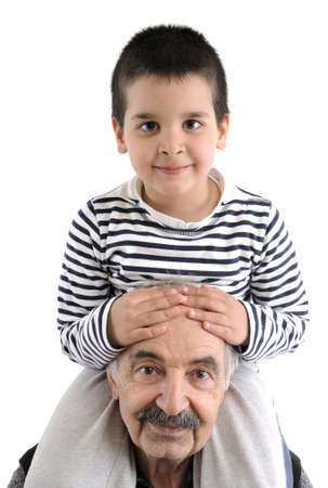 Happy kid at top of his grandpaの写真素材