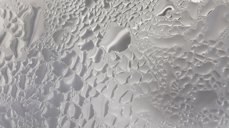 misted glass from hot steam boiling waterの写真素材