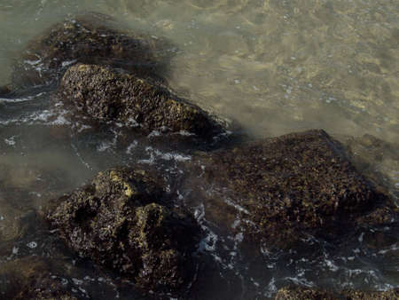  surf,stones in clear water,Mediterraneanの写真素材