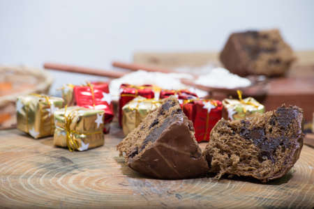 Christmas panettone on rustic table. some table decorations.の写真素材
