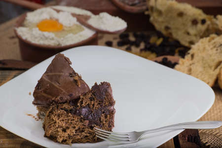 Christmas panettone on rustic table. some table decorations.の写真素材