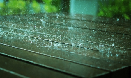 Rain falling on deck boards の写真素材
