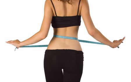  Woman showing how much weight she lostの写真素材