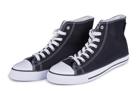 sport shoes pair over white backgroundの写真素材