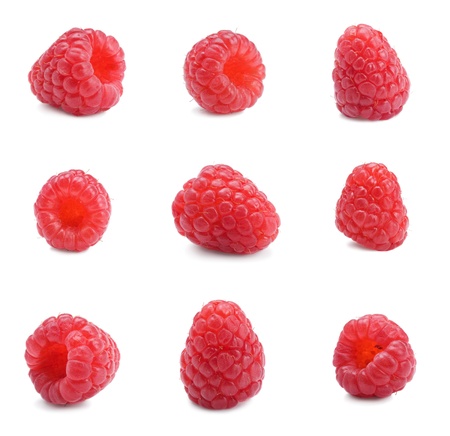 Fresh ripe red raspberries on white background