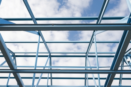 New residential construction home metal framing against a blue sky.Fragment.
の写真素材