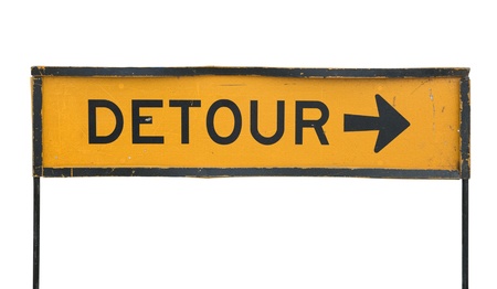 old detour traffic sign isolated on a white backgroundの写真素材