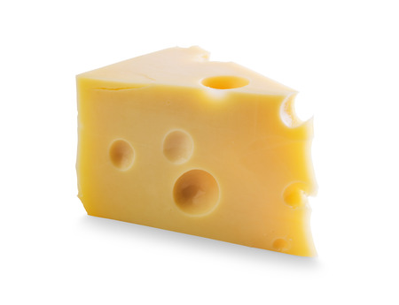 Piece of Cheese with holes isolated on white backgroundの写真素材