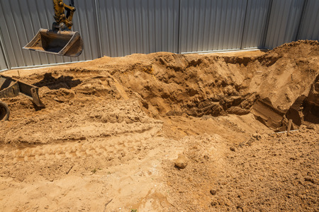 Excavation works for the installation of a swimming pool.Swimming pool under construction.の写真素材