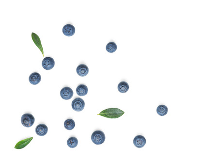 Fresh Blueberries with leaves isolated on white background. Flat lay, top viewの写真素材