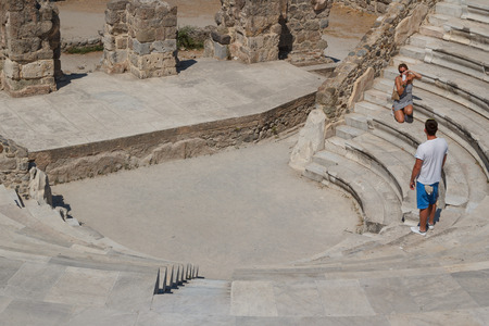 KOS / GREECE - AUGUST 2014: Tourists in Roman ruins in the Kos town, Kos island, Greeceのeditorial素材