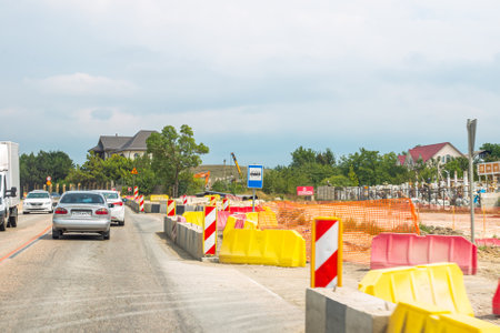Crimea, Russia - 08.20.2019: Under construction roads with detour and working vehiclesのeditorial素材