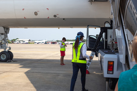 Pattaya, Thailand - 01/21/2020: plane gangway is preparing for landing touristsのeditorial素材