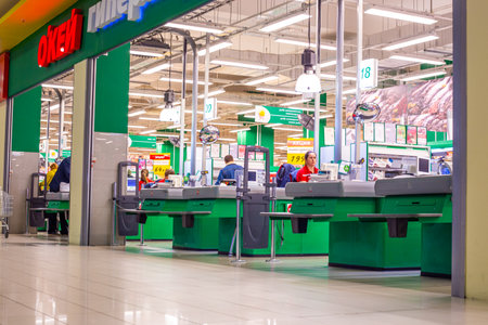 Surgut, Russia - 10.13.2019: supermarket with rows of cash registers at the exit, empty storeのeditorial素材